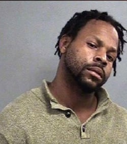Accused of shooting two people over dog poop in Louisville.