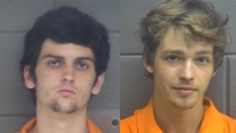 Zachary Arnett and Kyle Robinson are accused of robbing a man at gunpoint