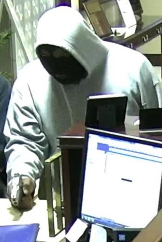 Security camera image of man accused of robbing Central Bank branch on West New Circle Road in Lexington at gunpoint on 5-13-19