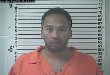 Accused of killing 4-year-old foster child.