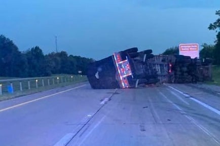 Semi truck overturns on I-64 in Woodford County