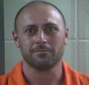 Sheriff says he was found wandering around naked outside a Laurel County business after taking drugs.
