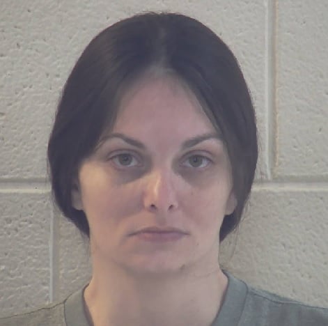 Plead guilty to letting her children to be used for forced labor.