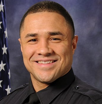 Lexington Police officer who fired his weapon but suspect ended up shooting himself with his own gun.
