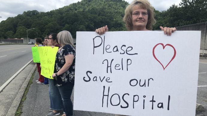 Employees protest outside Pineville Community Hospital 8-7-19