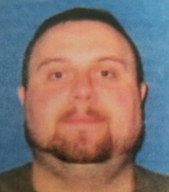 Pleaded guilty to stealing money from armored truck in Louisville.