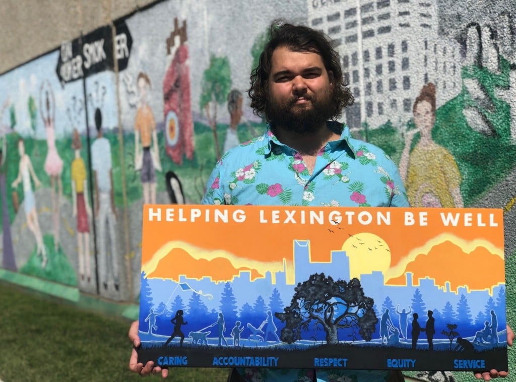 Artist Jeremey Burch and his mural design for the Lexington-Fayette County Health Department main building