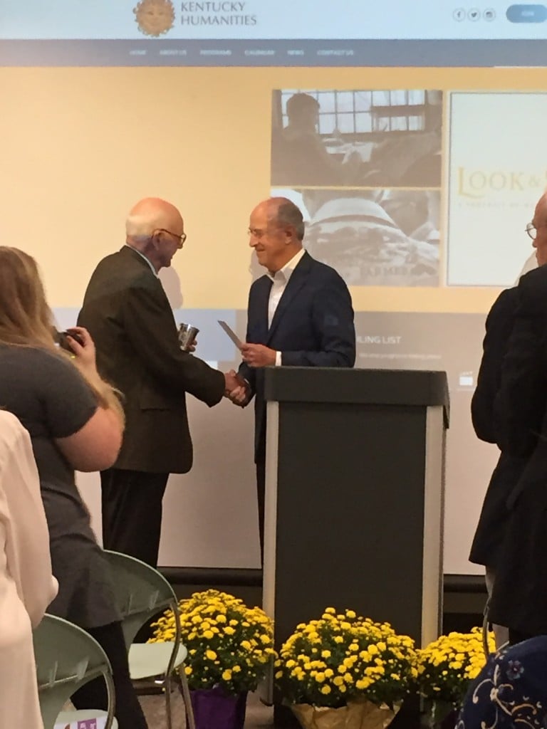 Bill Goodman presents award winner Wendell Berry