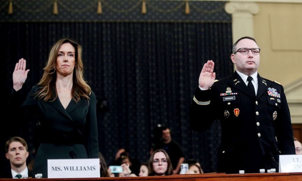 PHOTO: Jennifer Williams and Alexander Vindman are sworn in to testify before a House Intelligence Committee hearing on Capitol Hill in Washington D.C., Nov. 19, 2019.