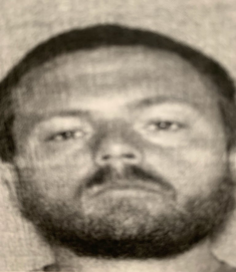 Adam G. Akers