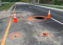 Westbound lanes of Mountain Parkway closed by a sinkhole on 7-22-20.