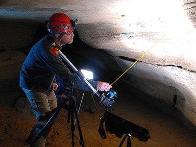 person working in a cave
