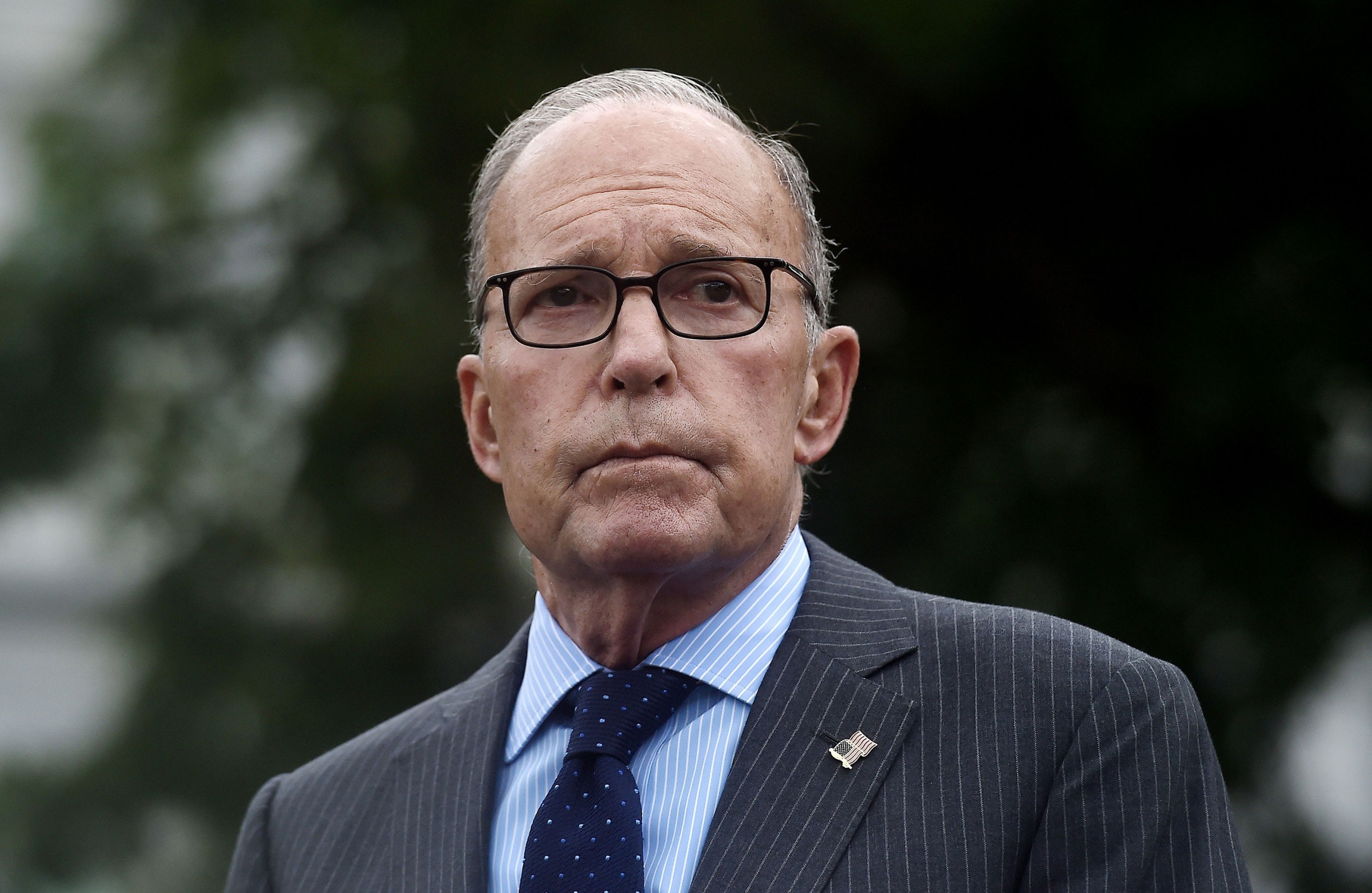 Larry Kudlow speaks to reporters outside the West Wing of the White House on September 2.