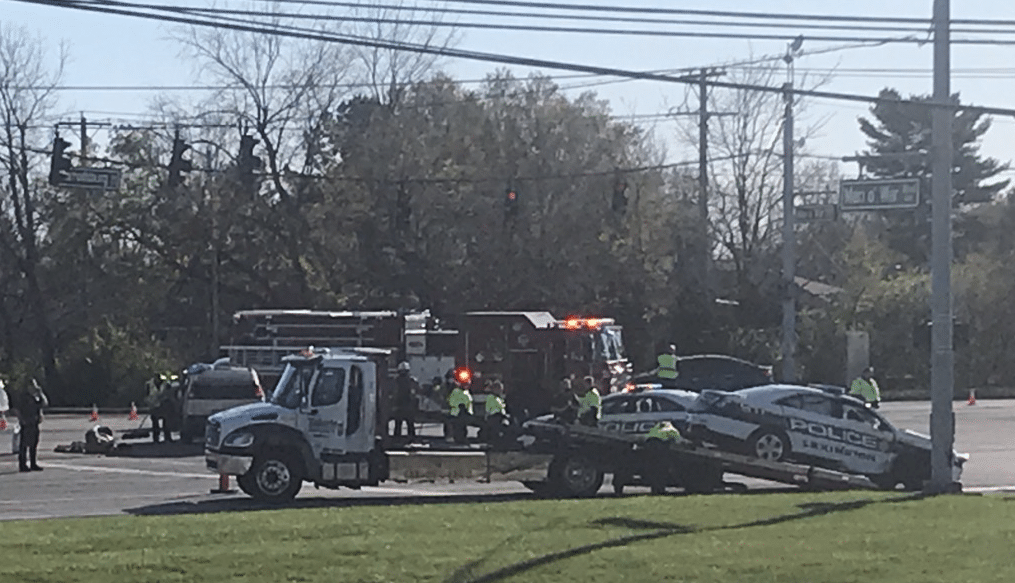 Lexington Police car on its way to a call with lights and siren on involved in collision at Harrodsburg Road at Man O' War Boulevard on 11-16-20.  The officer and several other people suffered minor injuries.  The police car and one other vehicle involved.