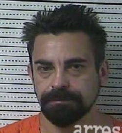 Danville man accused of breaking into his neighbor's apartment with a knife
