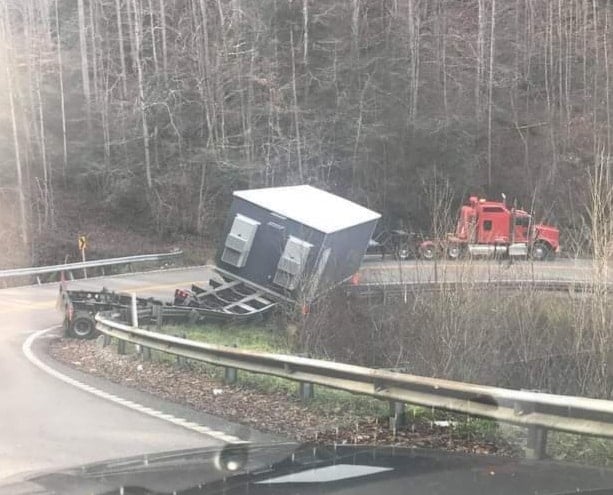 A stretch of US 421 on the side of Virginia Mountain in Harlan County was closed for hours on 12-15-20 after a tractor-trailer failed to negotiate a curve and went up on a guardrail