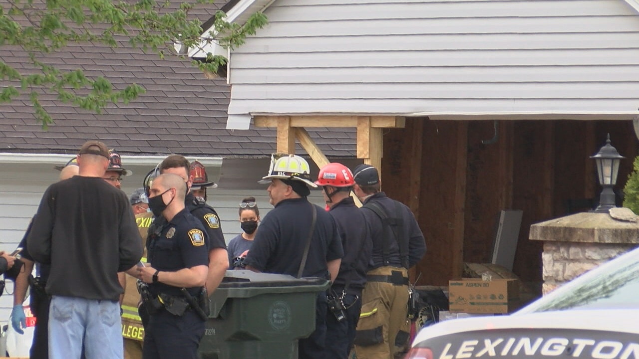 Car crashes into garage of Lexington home - WTVQ