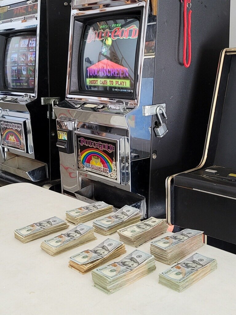 Illegal gambling machines and cash seized by Nicholasville Police and the FBI at a business in S. Main Street on 5-19-21