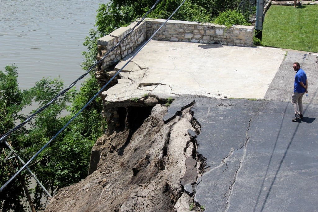 Portion of parking lot collapses down embankment to shore of Kentucky River in Frankfort 7-9-21