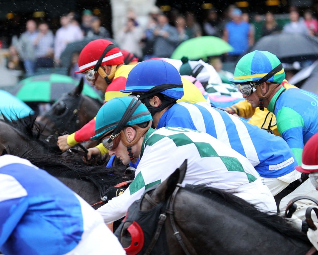 Horses break from the starting gate at Keeneland during the spring meet