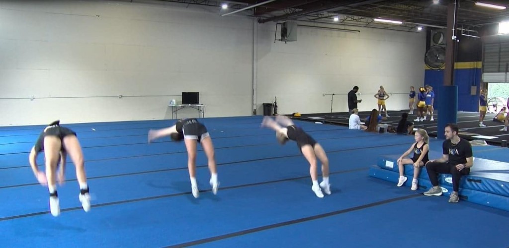 Athletes doing back flips at Kentucky Cheer Academy in Lexington
