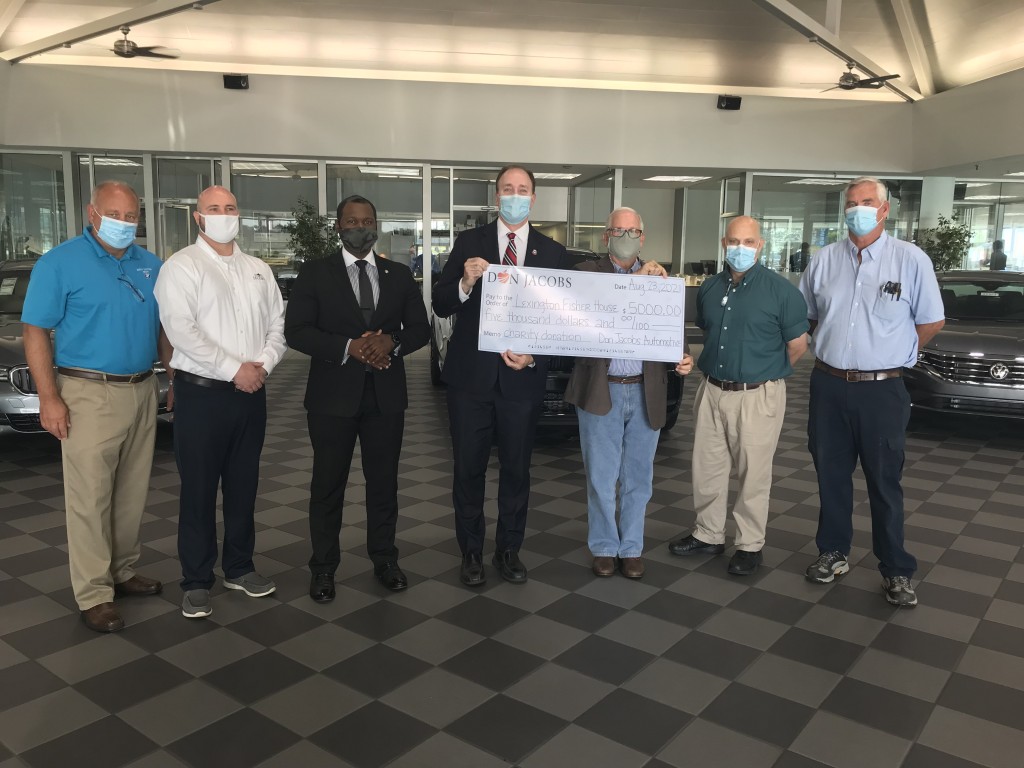 Don Jacobs Automotive Group in Lexington presents check for $5