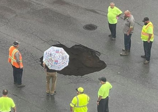 Sinkhole opens 8-19-21 in downtown Ashland at Greenup Avenue and 17th Street