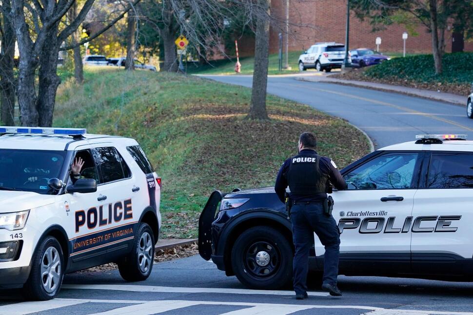 Charlottesville police secure a crime scene of an overnight shooting at the University of Virginia, Monday, Nov. 14, 2022, in Charlottesville. Va. (AP Photo/Steve Helber) THE ASSOCIATED PRESS