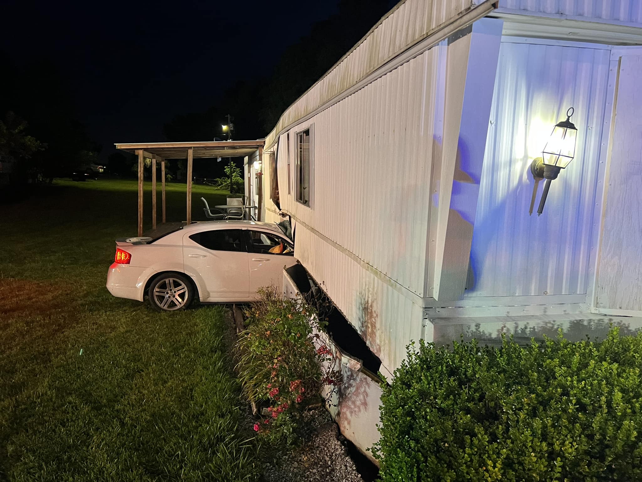 Monticello police investigating after car crashes into mobile home on