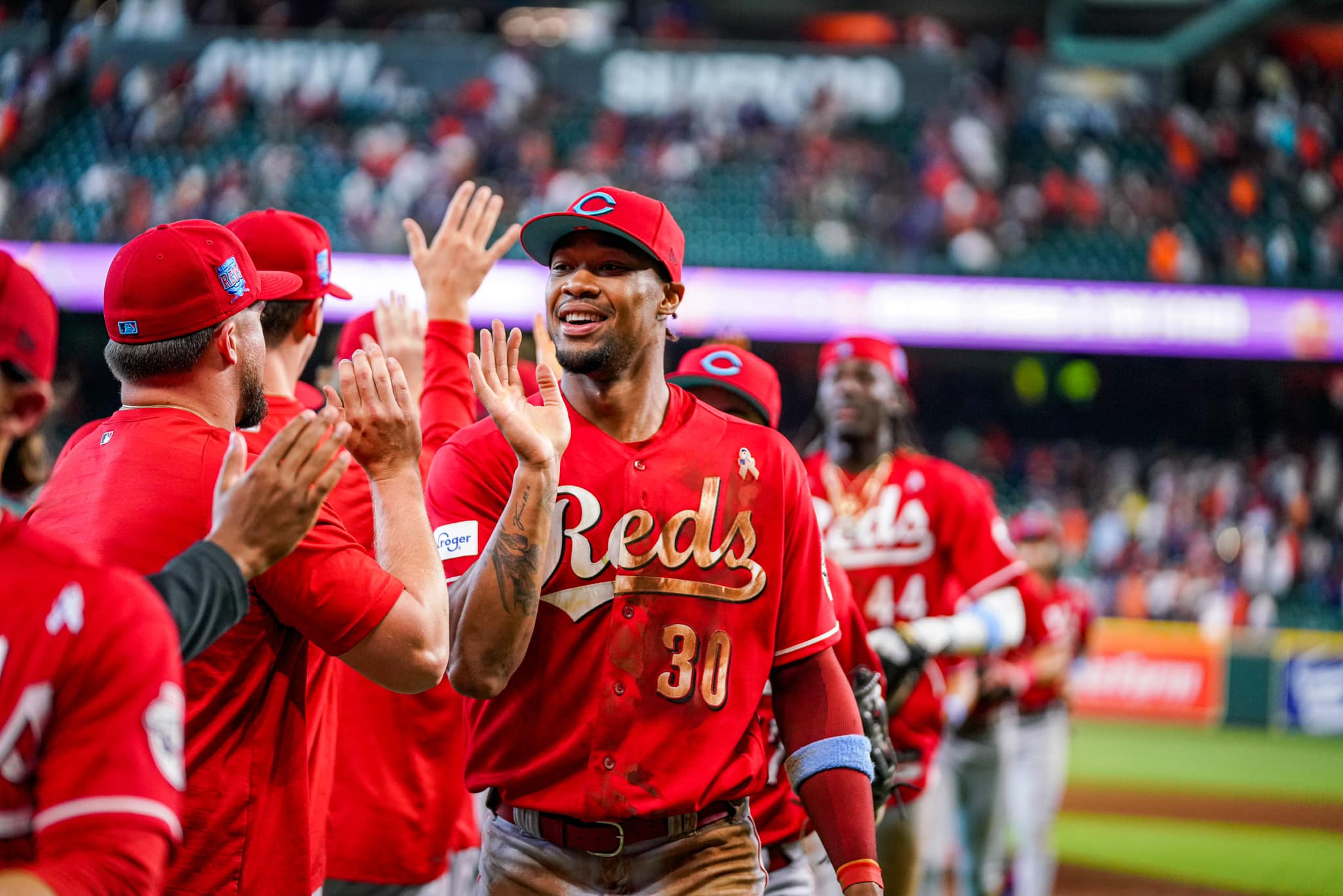 Reds sweep Astros in extras for 8th straight win