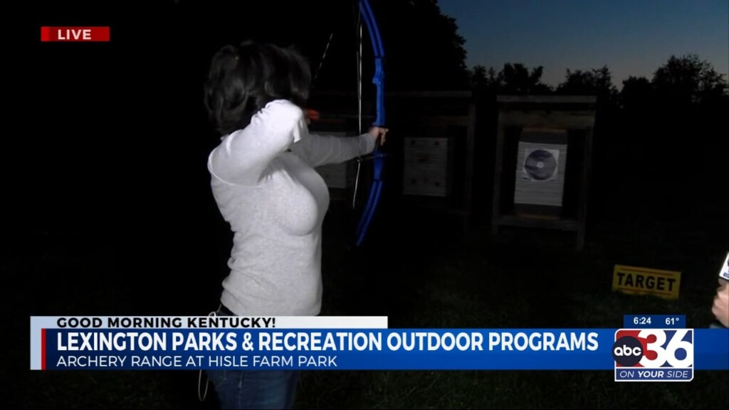 Kim Dixon Is Out There At Hisle Farm Park Showing Her Archery Chops With Lexington Parks & Recreation Specialist Jennifer Meunier.