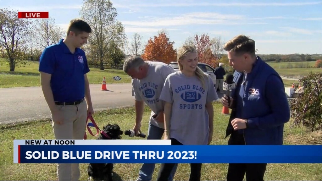 Misty The Weather Dog Helps Hand Out Solid Blue T Shirts!