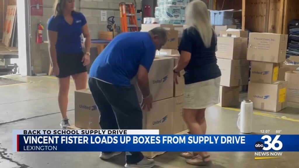 Vincent Fister Loads Up Boxes After The School Supply Drive