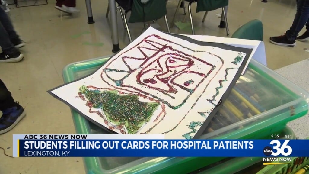 Students Fill Out Cards For Hospital Patients