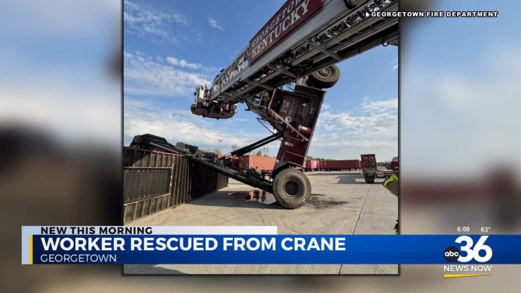 Firefighters Rescue Worker From Flipped Crane