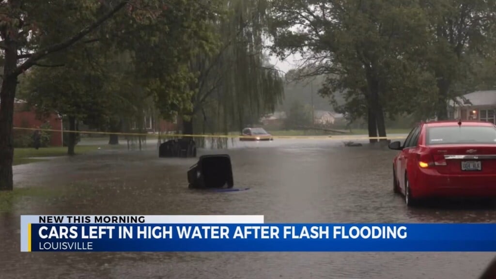 Cars Submerged In Flash Flooding