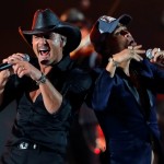 Tim Mcgraw (l) And Shy Carter Perform During The Iheartradio Music Festival At T Mobile Arena In Las Vegas