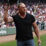 Country Singer Adkins Tips His Hat To The Crowd After Singing The National Anthem Before The Start Of American League Mlb Baseball Action Between The Red Sox And Yankees In Boston