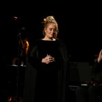 File Photo: Singer Adele Is Applauded As He Finishes Her Tribute To The Late George Michael At The 59th Annual Grammy Awards In Los Angeles