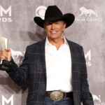 George Strait Poses With His Entertainer Of The Year Award At The 49th Annual Academy Of Country Music Awards In Las Vegas