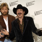 Dunn And Kix Brooks Of Brooks & Dunn Hold Their Awards Backstage During The 2005 American Music Awards In Los Angeles