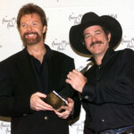Ronnie Dunn (l) And Kix Brooks Of Brooks And Dunn Hold Their Award For Favorite Country Band, Duo Or..