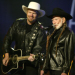 Toby Keith And Willie Nelson Perform At American Music Awards.