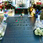 Flowers And Birthday Wishes From Around The World Lie Beside The Grave Of Elvis Presley At His Home At Graceland In Memphis