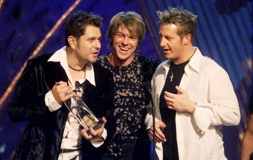 Rascal Flatts’ Jay Demarcus, Left, Joe Don Rooney And Gary Levox Accepts The Horizon Award During The 36th Annual Cma Awards Show At The Grand Ole Opry House On Nov 6, 2002. Their Debut Album Sold Over A Million Copies And Whose Recent Sophomore “melt.