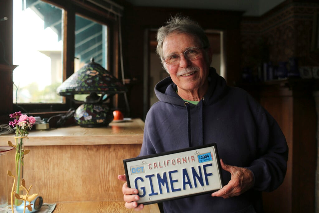 Country Joe Mcdonald, A Musician Who Was The Lead Singer In The 1960's Band "country Joe And The Fish," Poses With His Vanity License Plate At His Home In Berkeley