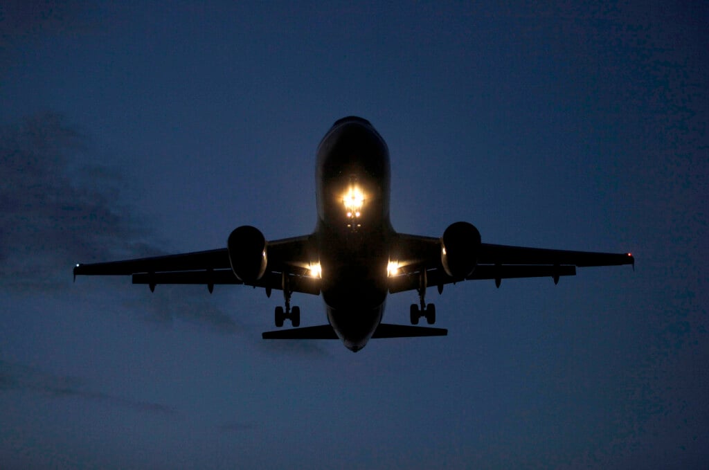 A Plane Lands At Ronald Regan National Airport In Washington