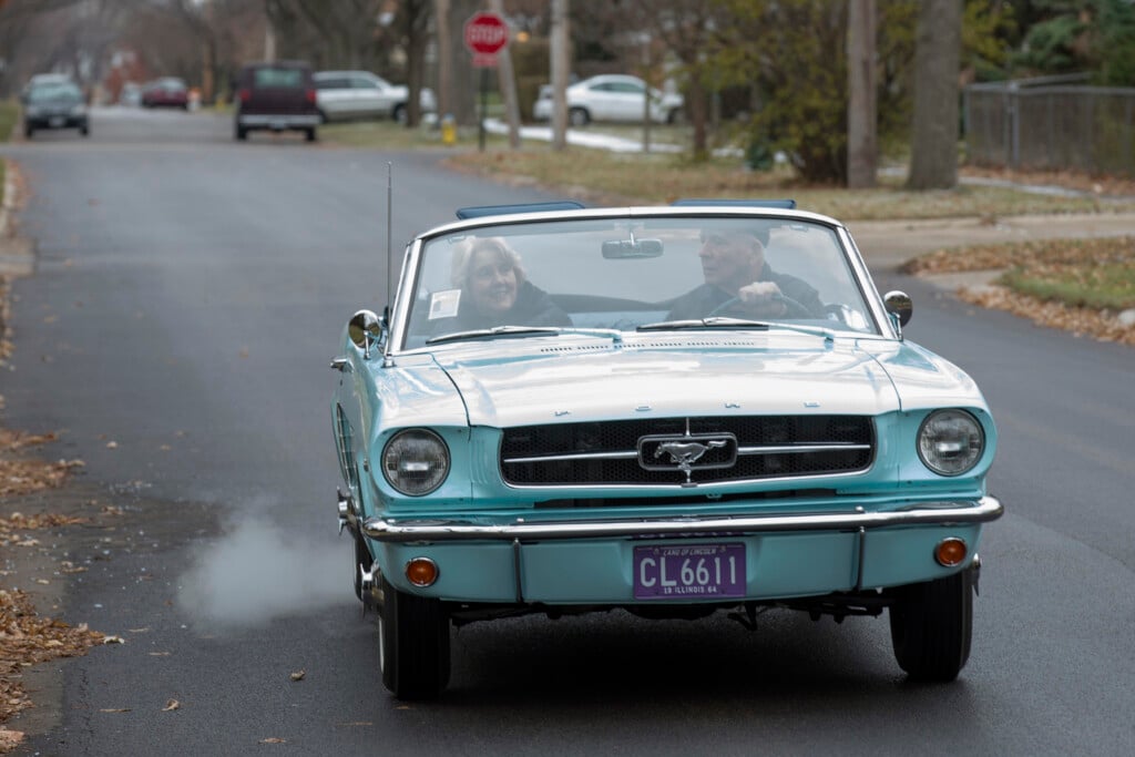 Tom And Gail Wise Ride In Gail's Skylight Blue 1964 1/2 Ford Mustang Convertible Near Their Home In Park Ridge