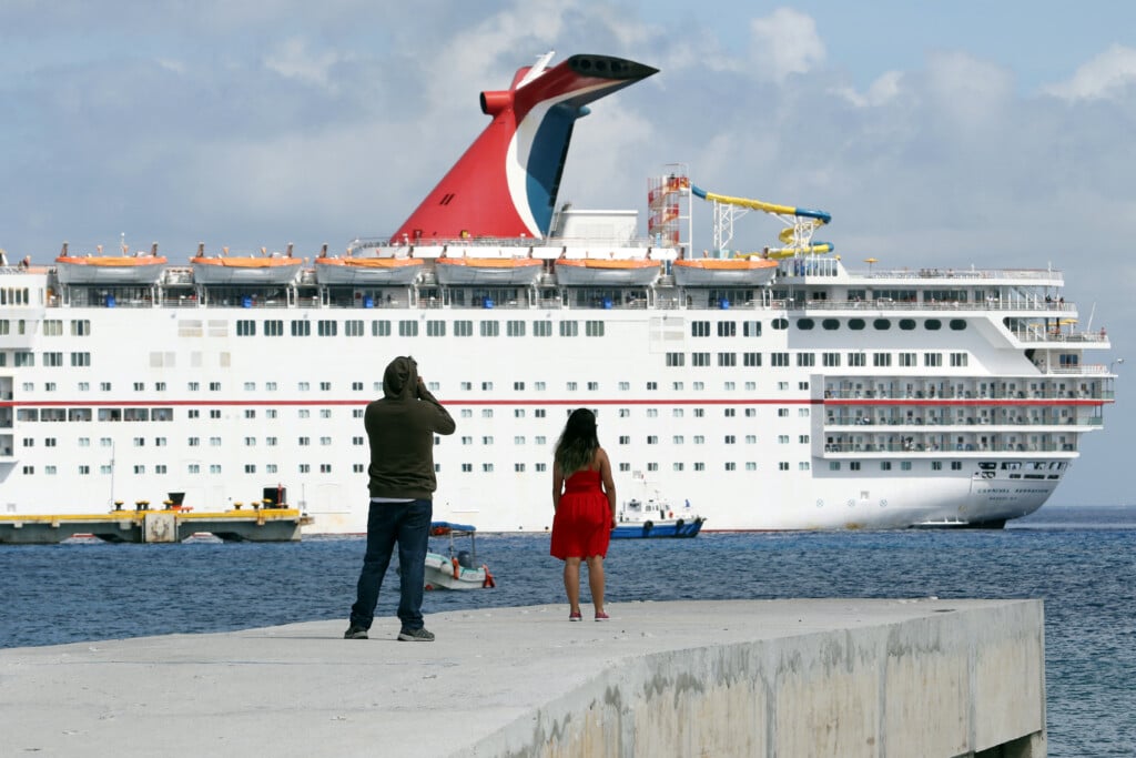 People Look At The Cruise Ship Carnival Sensation, Operated By Carnival Cruise Line, After It Was Diverted From Cuba Following The Trump Administration's Ban On Travel To The Caribbean Island, In Cozumel