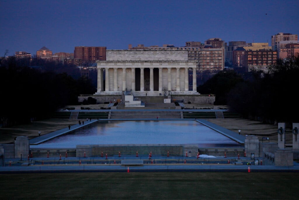 People Walk Around The Lincoln Memorial During Early Morning, In Washington, D.c.